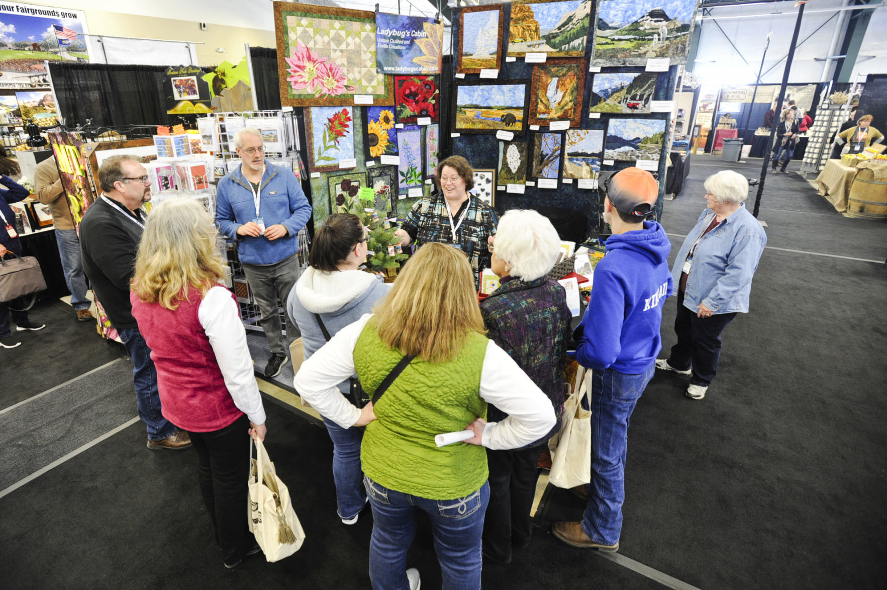 Buyers crowd around the Ladybug's Cabin booth